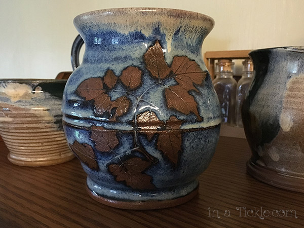 Blue-Pottery-Vase-with-Peppervine-Leaves